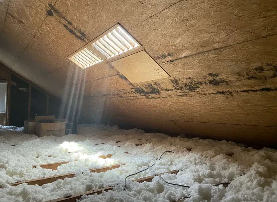 Staining on attic roof decking around a vent